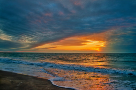 Clouds Front over Ocean at Sunset © David Arment