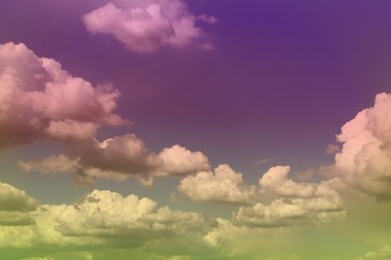 lovely unreal toned fantasy cumulus partially cloudy sky for using in design as background.