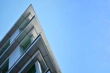 The windows of a modern building for offices. Business buildings architecture.