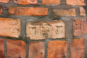 Fototapeta premium Red old bricks. Masonry. Wall texture. Close up