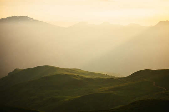 Scenic view of mountain range and fog