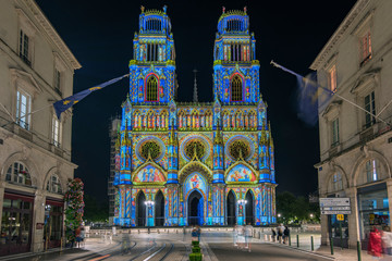 Joanna of Arc street that flows into the Church of the Holy Cross in Orleans, France. Illuminated with the technique called maping