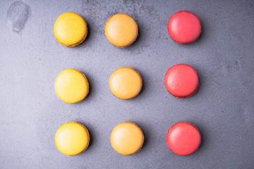 Different types of colourful macaroons in close up, Sweet and colourful french macaroons.