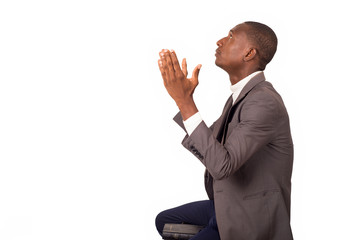 portrait of young man praying.