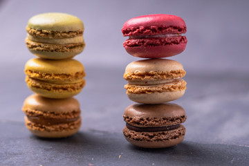 Different types of colourful macaroons in close up, Sweet and colourful french macaroons.