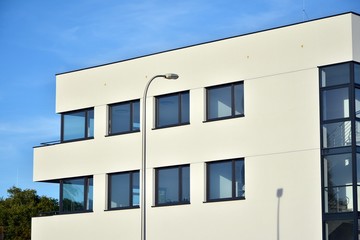 The windows of a modern building for offices. Business buildings architecture.