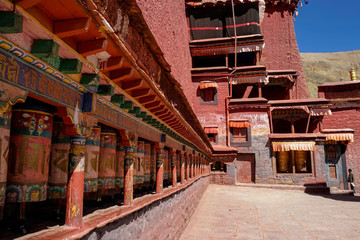 Fototapeta premium CLOSE UP: Scenic view of a large red buddhist building in Sakya monastery.