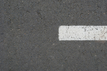 Fototapeta premium New asphalt texture with white dashed line
