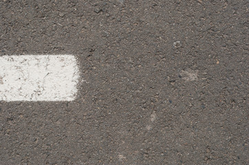Fototapeta premium New asphalt texture with white dashed line