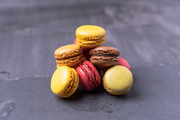 Different types of colourful macaroons in close up, Sweet and colourful french macaroons.