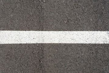 New asphalt texture with white line. Top view