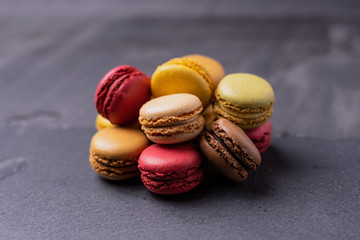 Different types of colourful macaroons in close up, Sweet and colourful french macaroons.