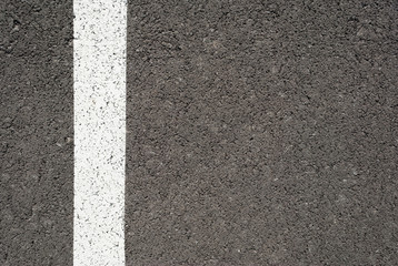 New asphalt texture with white line. Top view