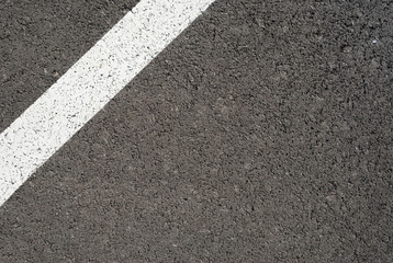 New asphalt texture with white line. Top view