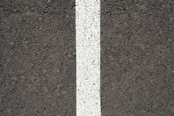 Fototapeta premium New asphalt texture with white line. Top view
