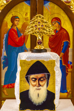 Secovska Polianka, Slovakia. 2019/8/22. The relics of Saint Charbel displayed for veneration in front of the the Iconostasis in the Greek Catholic church of Saint Elijah.