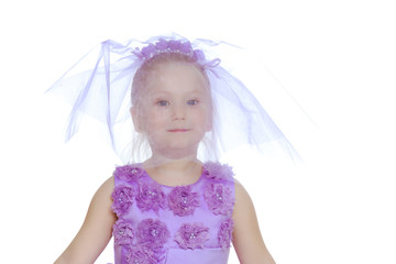Little girl in purple dress.