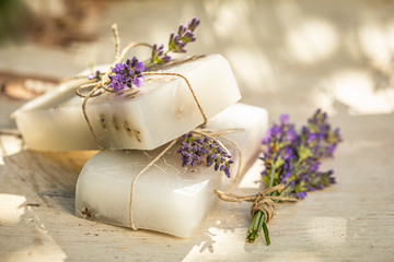 Fototapeta na wymiar Natural and moisture lavender soap in summer garden
