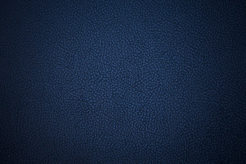 Old blue dermantine. Artificial dark skin. Close-up. Background. Texture.