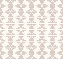 Subtle vector geometric triangles seamless pattern. Light brown and beige color