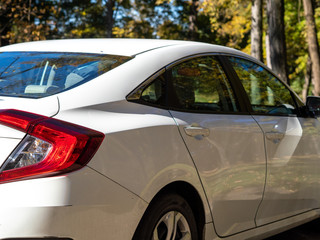 side view of a white modern car
