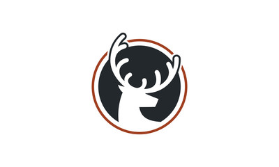 Stylized stag head silhouette with antlers in a circular emblem