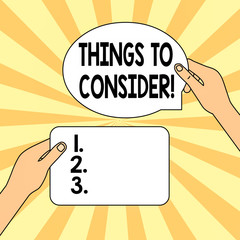 Writing note showing Things To Consider. Business concept for think about something carefully in order to make decision Two Figured Tablets Signs Held in Hands One Above Other Text Space
