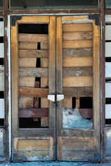 Old broken wooden door for background and texture