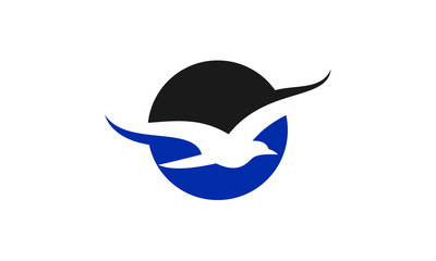 Abstract circular logo design featuring a soaring white bird against a blue and black background