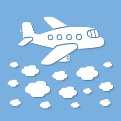 Fototapeta na wymiar Airplane flying above clouds