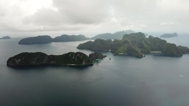 Aerial flight over the Philippines on a cloudy day in Asia. Nature landscape pardise.