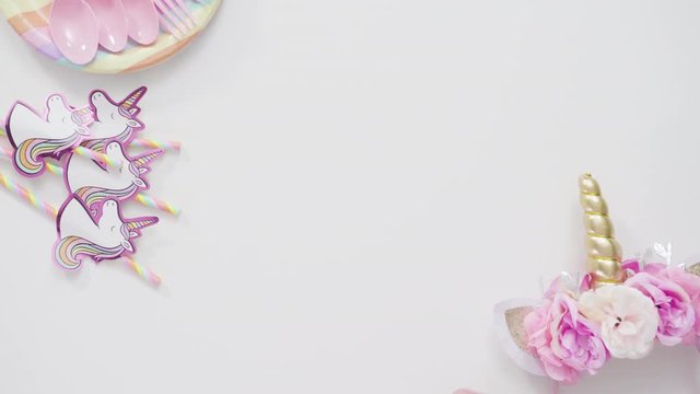 Flat lay. Objects for unicorn themed kids birthday party.