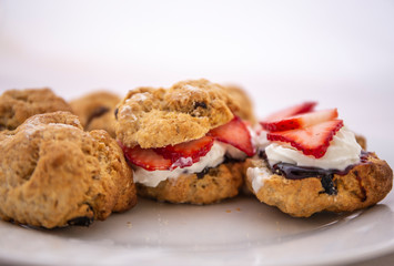 Scones with cream, strawberry and Jam