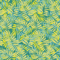 A seamless vector tropical pattern with overlapping palm leaves in yellow and teal green. Surface print design.