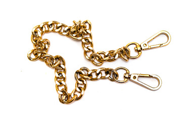 Gold chain of large cross section on a white background.