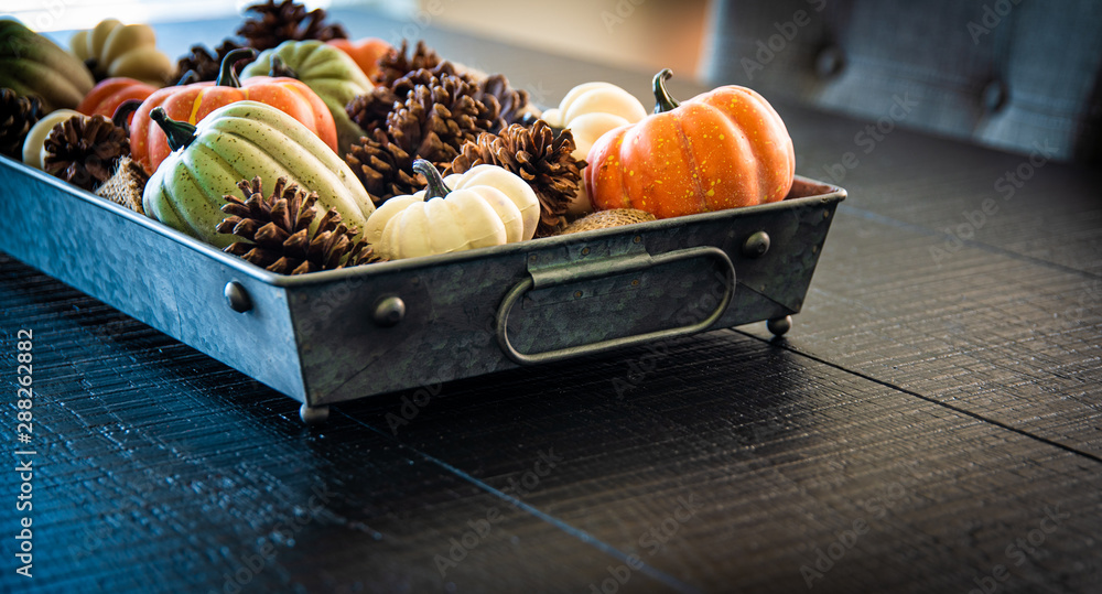 Wall mural table centerpiece of fall harvest in metal tray