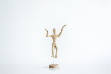 wooden figure on white background