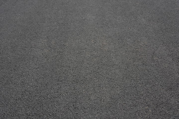 Pure asphalt road background closeup