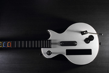 white toy guitar