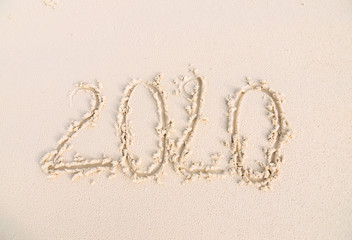 Happy New Year 2020 on the sand and beach