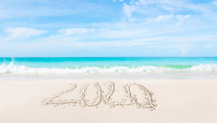 Happy New Year 2020 on the sand and beach