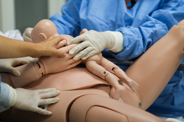 Details with plastic dummies representing a woman and her newly born baby used by medics and...