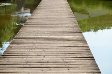 wooden bridge on a lake