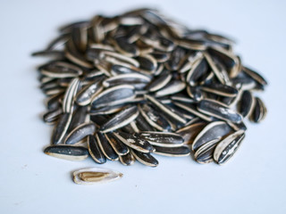 Sunflower seed snack or kuaci on white background.