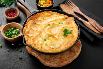 Shepherd's pie, traditional British dish with minced meat, vegetables and mashed potatoes.
