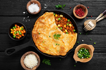 Shepherd's pie, traditional British dish with minced meat, vegetables and mashed potatoes.