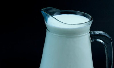 Fresh milk Mix in a pot on black background, Food Concept, Full HD..