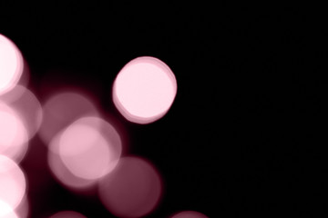 Pink color abstract bokeh. Christmas blurred background