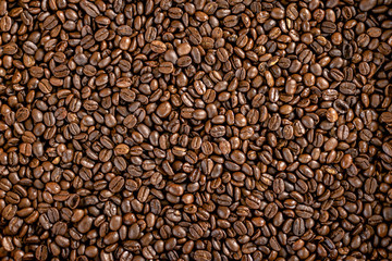 Roasted coffee beans texture background 