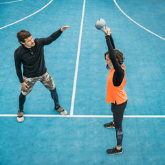 Kettlebell Strength Training with Personal Trainer Outdoors